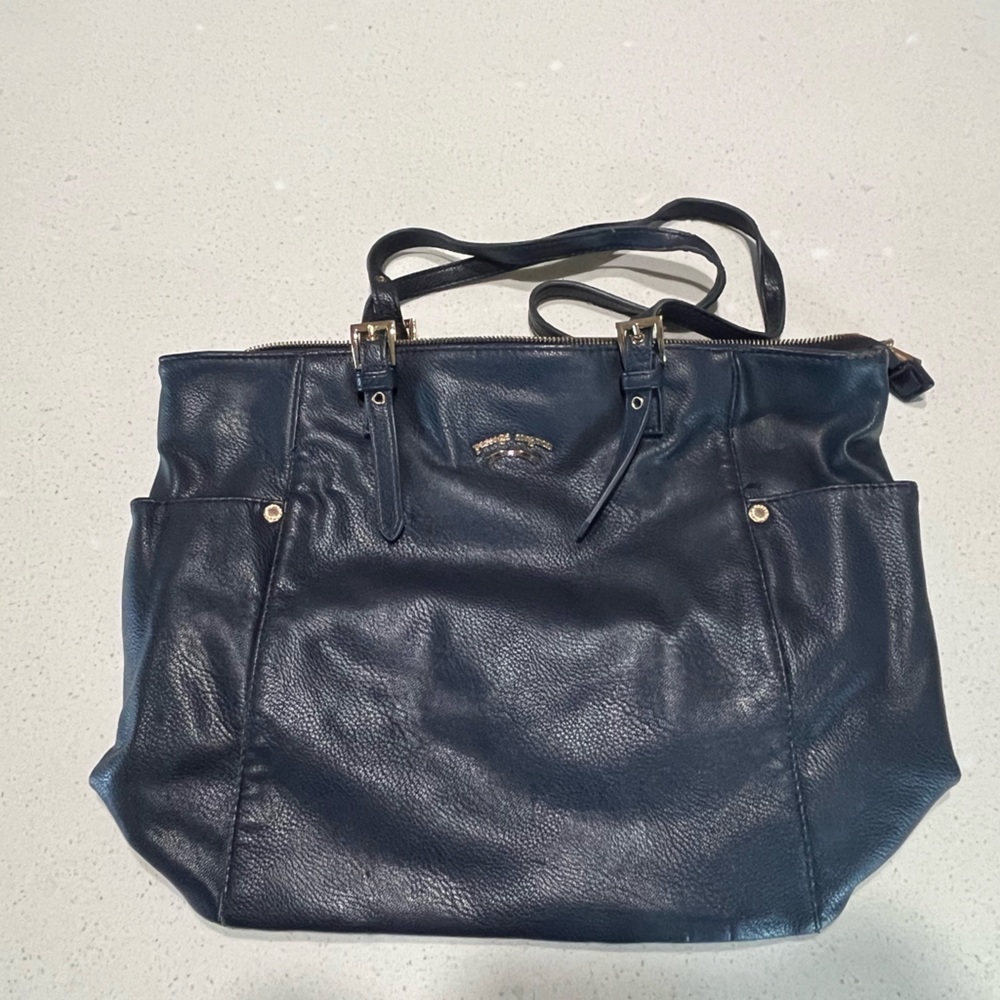 Blue leather medium size purse. Brand is passage mignon